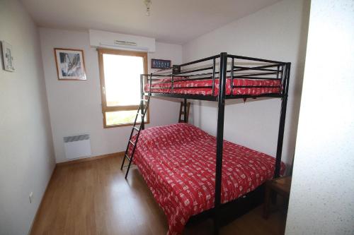 Ένα ή περισσότερα κρεβάτια σε δωμάτιο στο Appartement calme et lumineux, bord de mer à 1 minute à pied de la plage