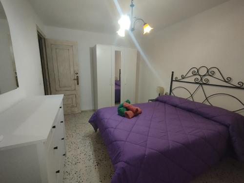 Postel nebo postele na pokoji v ubytování Casa Violeta