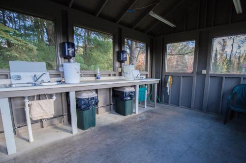 a bathroom with two sinks and two windows at 3 Bedroom condo at Wild Eagle Lodge in Eagle River