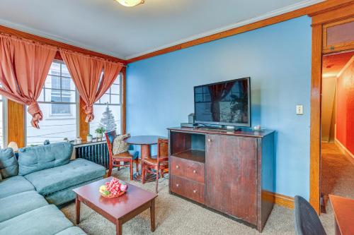 a living room with a couch and a tv at Historic Home with Yard in the Heart of Reading! in Reading