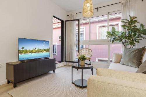 Et tv og/eller underholdning på ViVi Homes - Anemona , Beach , Balcony, Centre