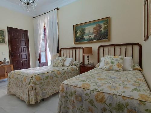 Postel nebo postele na pokoji v ubytování Casa San José