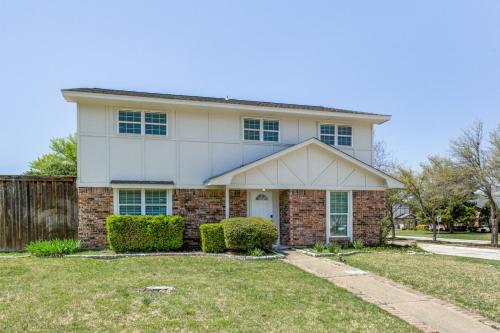 a large white house with bushes in front of it at Texas - Reston 1513 in McKinney