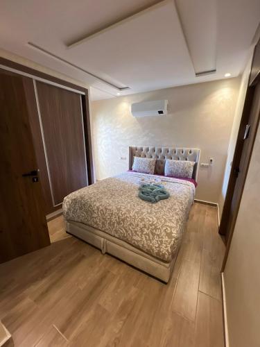 Postel nebo postele na pokoji v ubytování Apartment proche gueliz