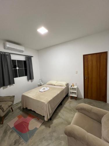 Ένα ή περισσότερα κρεβάτια σε δωμάτιο στο Residence Tropical Premium