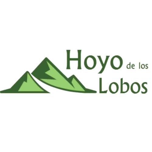 a logo for hoyo los lobos at Hoyo de Los Lobos in Hoyocasero