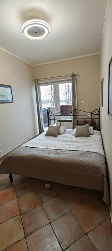 Katil atau katil-katil dalam bilik di Apartamenty Smętek