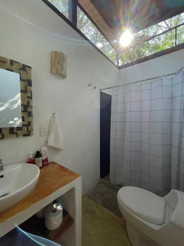 Koupelna v ubytování Centro Sati Bungalow