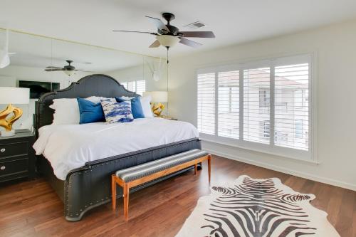 a bedroom with a bed and a ceiling fan at Million-Dollar Views Condo on Lake Hamilton! in Hot Springs