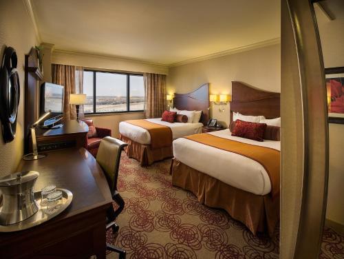 Postel nebo postele na pokoji v ubytování Choctaw Casino Resort - Durant