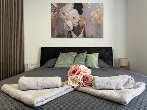 Postel nebo postele na pokoji v ubytování Vlasic Apartmani HANA