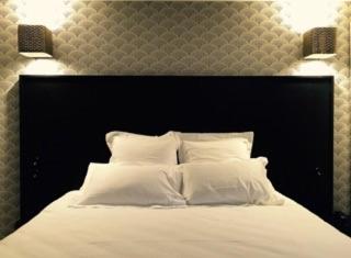 Ένα ή περισσότερα κρεβάτια σε δωμάτιο στο Urban Style Hotel des Carmes