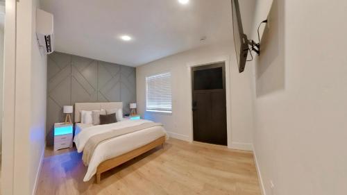 a bedroom with a large bed and a window at Cozy Studio in Heart of CDA Only 5 Min to the Resort And Lake in Coeur d'Alene