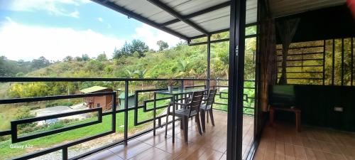 Cabañas Ecologe BLESSにあるバルコニーまたはテラス