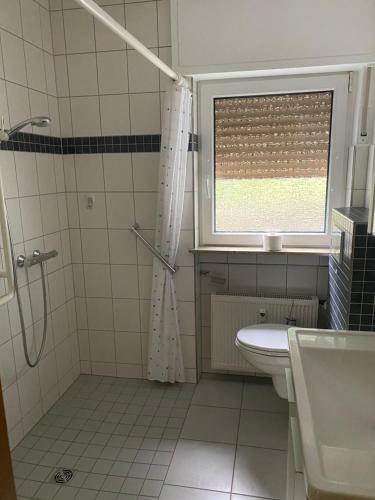 Ένα μπάνιο στο Ferienwohnung am Ellerbach