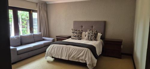 Ένα ή περισσότερα κρεβάτια σε δωμάτιο στο Luxury oasis retreat