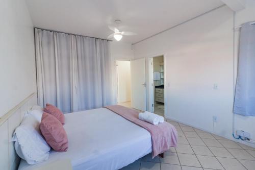 Postel nebo postele na pokoji v ubytování Residencial Baía Norte