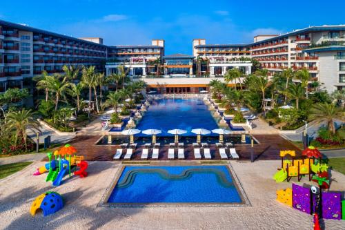 an aerial view of a resort with a swimming pool at Wyndham Grand Plaza Royale Wenchang in Wenchang