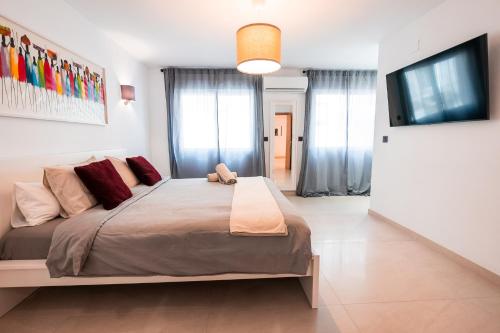 Ένα ή περισσότερα κρεβάτια σε δωμάτιο στο Luxurious Apartment in Javea near Beach