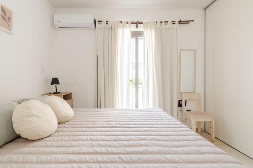 Postel nebo postele na pokoji v ubytování Alma Malbec Mendoza, comfortable apartment