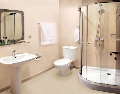 Ванна кімната в Panorama Resort&Suites