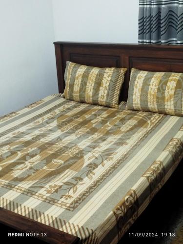Katil atau katil-katil dalam bilik di Wilpattu Gagana guest