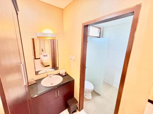 Koupelna v ubytování Segara Agung Boutique Hotel
