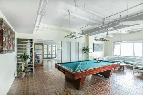 a billiard room with a pool table in it at Greenhills Elan Hotel Modern - Newly Renovated in Manila