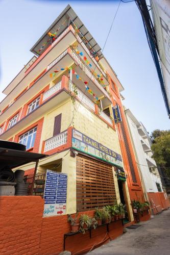 a building with a sign on the side of it at Thamel Hostel & Spa in Kathmandu