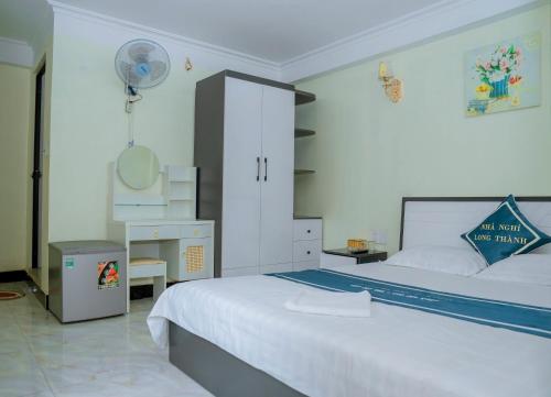 Postel nebo postele na pokoji v ubytování Long Thành Motel