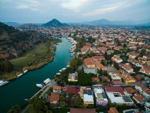 an aerial view of a town next to a river at Karaca Apart Hotel in Dalyan