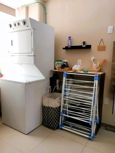 Kuchyň nebo kuchyňský kout v ubytování A23 SUITE WHITE para 1 a 2 personas, Especialistas en CORTAS, MEDIANAS Y LARGAS ESTANCIAS en IZCALLI TEPOTZOTLAN perfecto para Familias, Turistas, Contratistas, Estudiantes, Empresas A sólo 5 min Izcalli 5 min Esmeralda 20 min Satélite 25 min AIFA