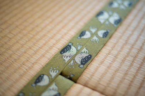a close up of a green tie with blueberries on it at Kaikyo View SHIMONOSEKI - Vacation STAY 15379v in Shimonoseki