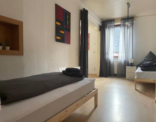Postel nebo postele na pokoji v ubytování Gemütliche 3 Zimmer Wohnung