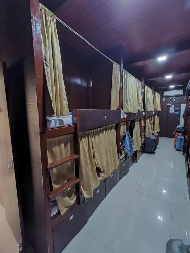a row of bunk beds in a room at ASRA DORMITORY For Male And Female in Mumbai