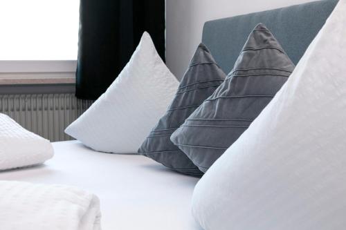 Uma cama ou camas num quarto em Hotel Unterrain