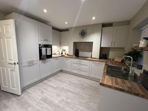 Køkken eller tekøkken på Robin Cottage