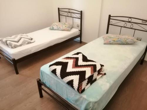 Postel nebo postele na pokoji v ubytování DIAMOND Villa