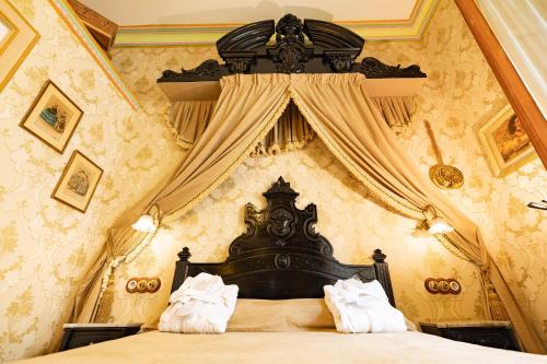 Posteľ alebo postele v izbe v ubytovaní Sitges Royal Rooms