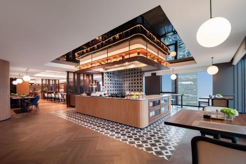 Μια τηλεόραση ή/και κέντρο ψυχαγωγίας στο IntercityHotel Haikou Guoxing Avenue