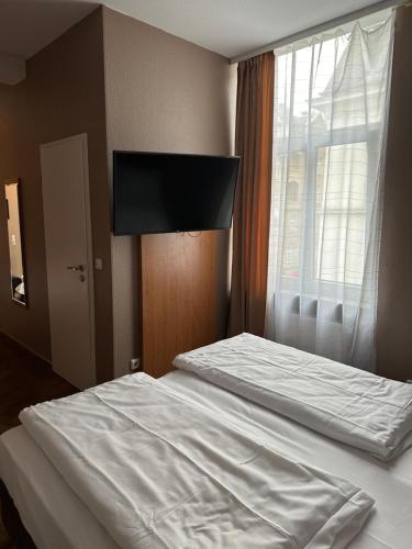 Cama o camas de una habitación en Hotel Expo Frankfurt City Centre