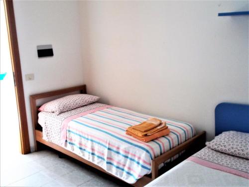 Postel nebo postele na pokoji v ubytování Home - Discover Cilento