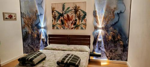 Una cama o camas en una habitación de Affittacamere Via Bini