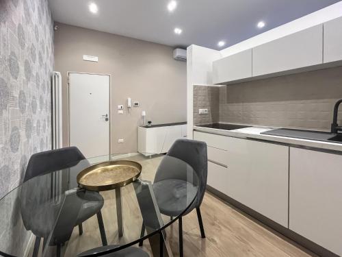 Kuchyň nebo kuchyňský kout v ubytování Casa Vacanza 66 Cimarosa Suite
