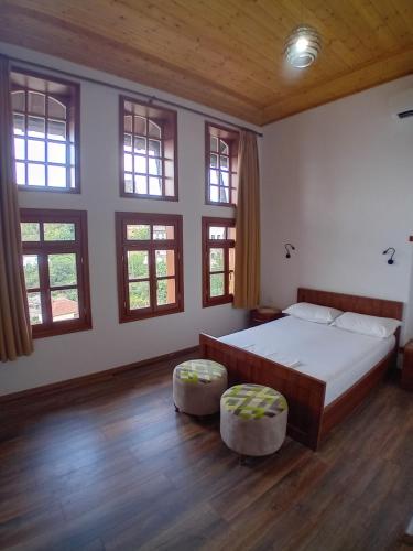 A bed or beds in a room at House H Çela