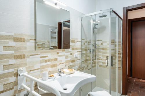 a bathroom with a sink and a shower at Torre dei Venti in Ceccano