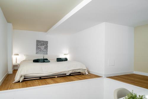 Voodi või voodid majutusasutuse Lucy's Loft - MM3 toas