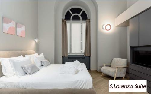 Postel nebo postele na pokoji v ubytování Q71 TIMELESS SUITES