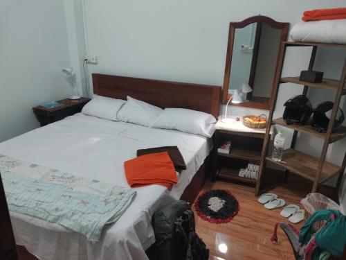 Postel nebo postele na pokoji v ubytování Bar Ang Guesthouse