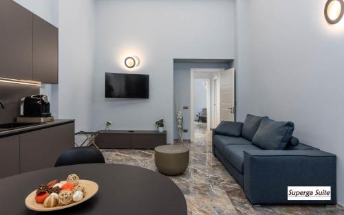 Posezení v ubytování Q71 TIMELESS SUITES